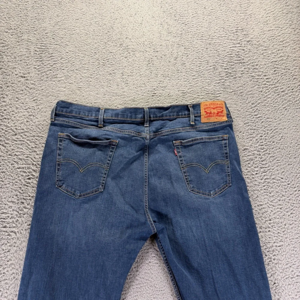 Levi's 502 Jeans Mens 44x34 Blue Cotton Denim Tapered Leg Faded Workwear Stretch